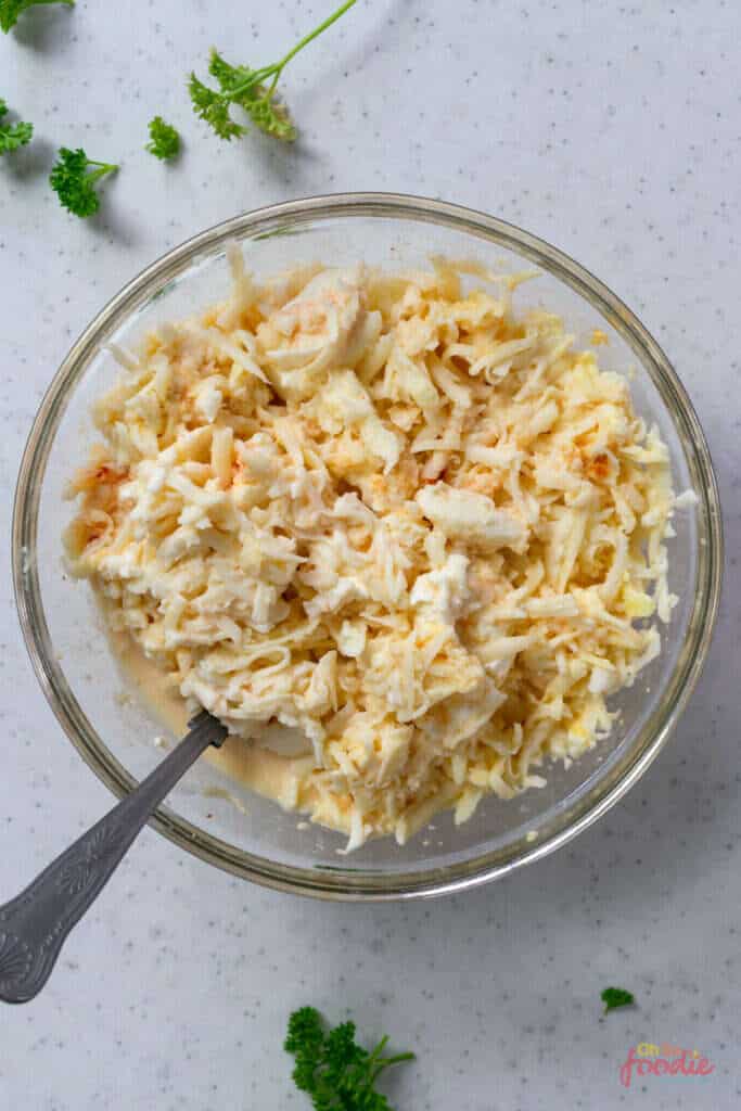making cheesy sauce for cauliflower mac and cheese