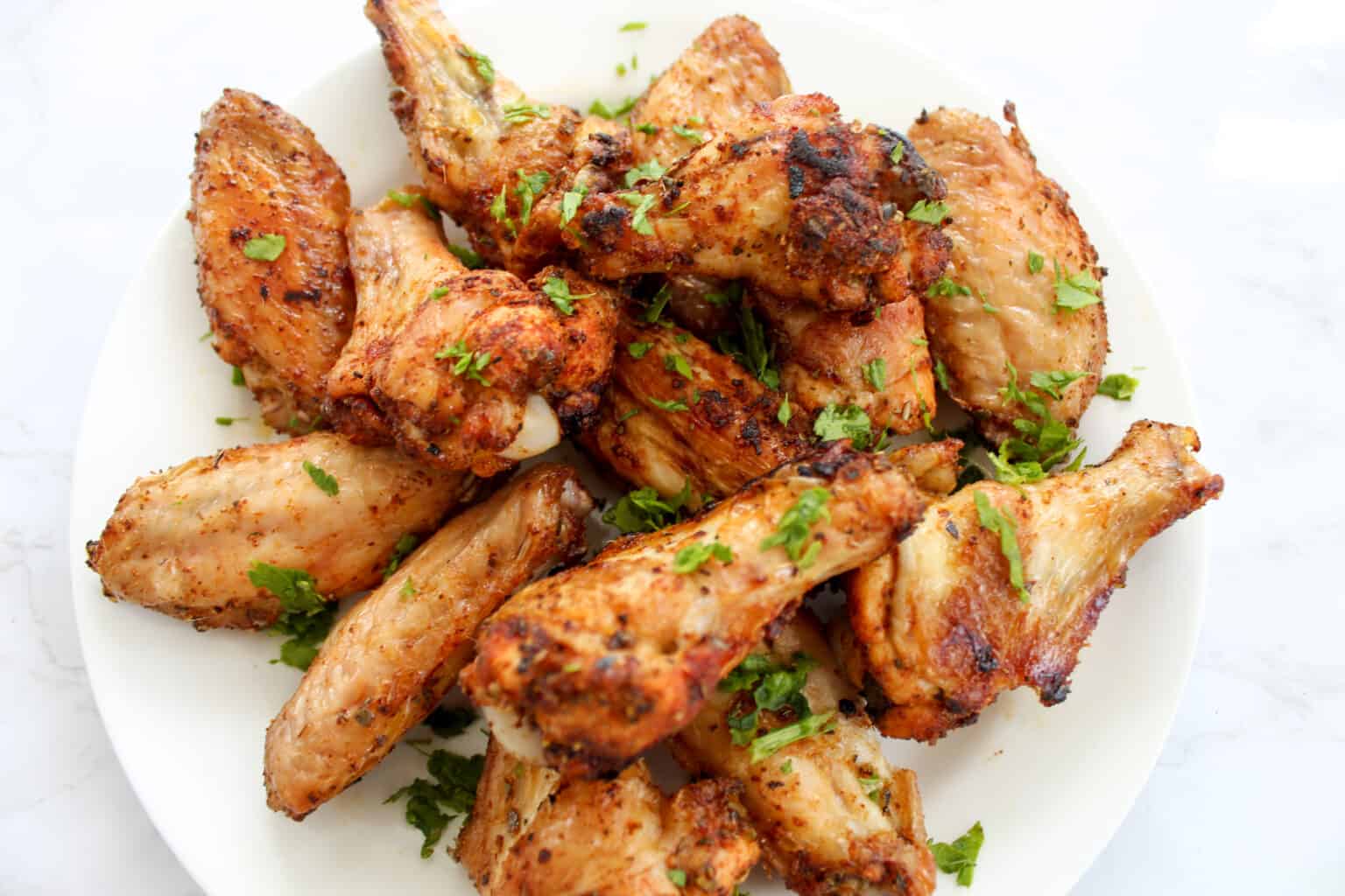 Super Yummy Baked Cajun Wings - Oh So Foodie